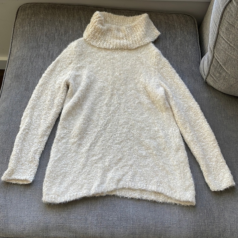 Cream colored Chico’s turtleneck size 0.